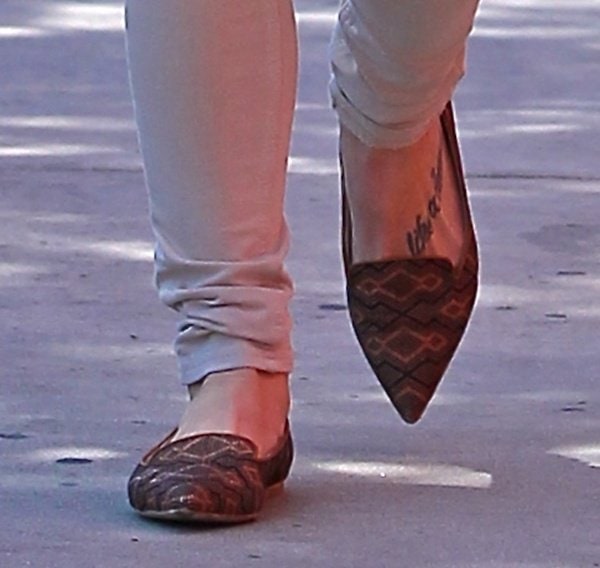 Ashley Greene's cute "life's a dance" tattoo on her left foot