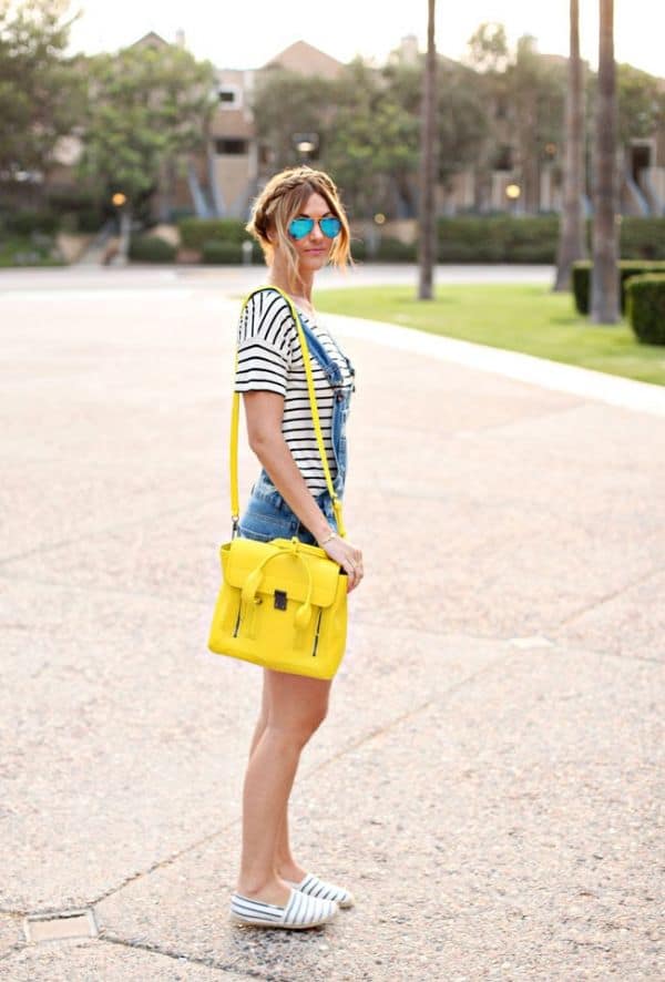 Caitlin Lindquist totes a bright yellow 3.1 Phillip Lim Pashli satchel