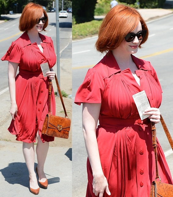 Christina Hendricks pairing her red frock with buttery brown extras as she heads to a private party in Brentwood, Los Angeles, on August 12, 2013