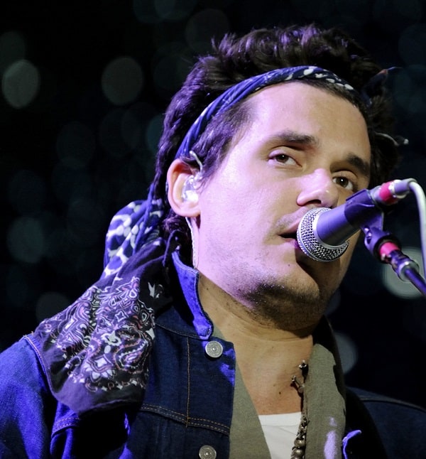 John Mayer in concert: Rocking a bandanna at the Molson Canadian Amphitheatre, Toronto, August 15, 2013 – a nod to boho chic or a style inspired by Katy Perry?