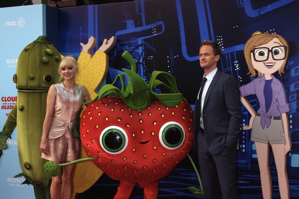 'Cloudy with a Chance of Meatballs 2' voice actors Anna Faris and Neil Patrick Harris posing with cartoon cutouts and mascots