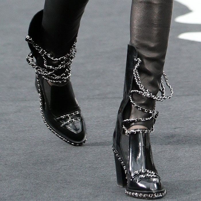 Chanel's Fall 2013 chained loafer boots, a unique fashion statement