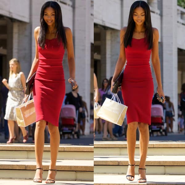 Chanel Iman showcases a chic Michael Kors Taylor clutch, complementing her ensemble with understated elegance