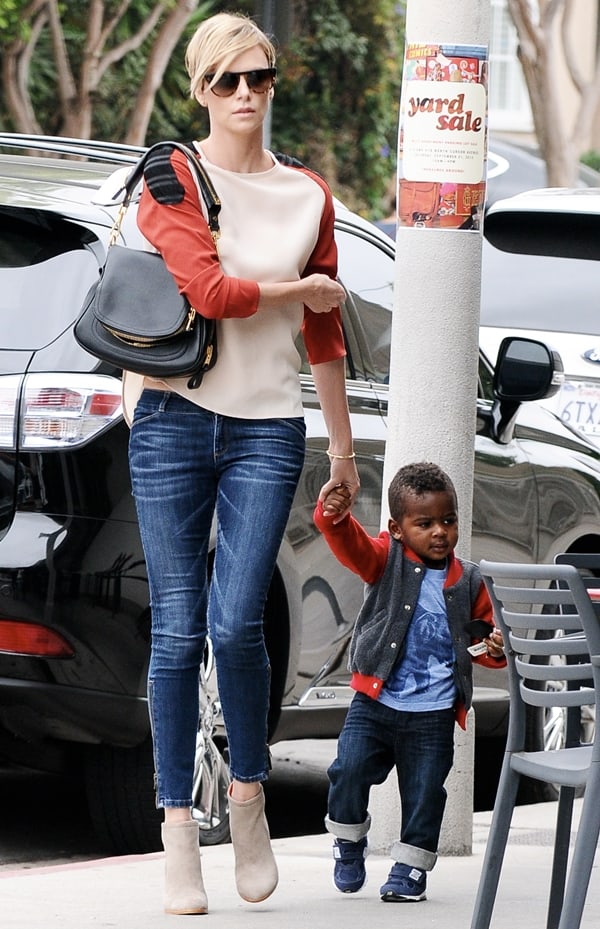 Charlize Theron and her son Jackson out for lunch in Hollywood on September 19, 2013, with Charlize looking effortlessly stylish in her casual ensemble