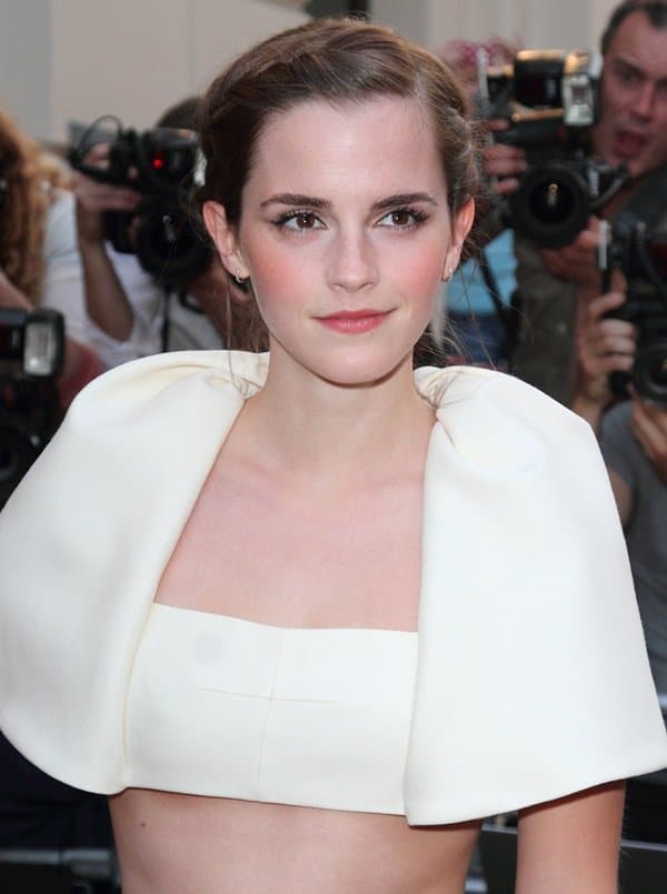 At the Royal Opera House in London, Emma Watson turns heads with her Balenciaga capelet top during the GQ Men of the Year Awards, 2013