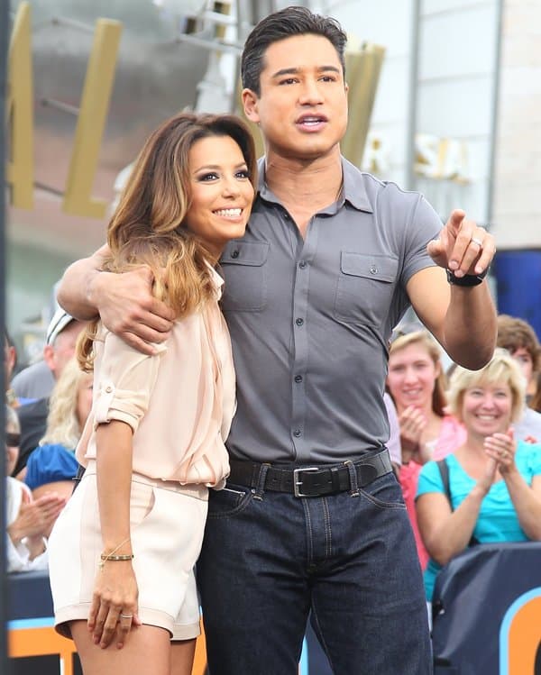 Long-time friends Eva Longoria and Mario Lopez enjoy their time on set at Universal City Walk