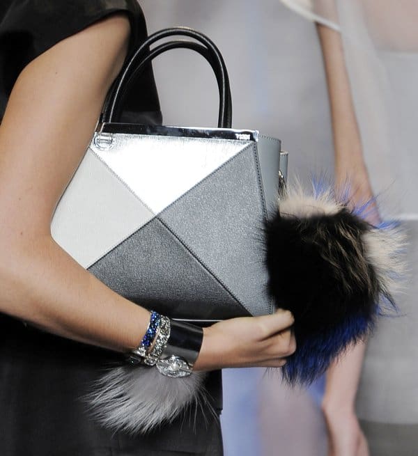 Fendi's geometric handbag with metallic finishes and fur detail showcased at Milan Fashion Week Spring/Summer 2014