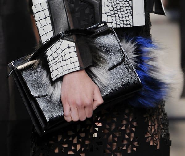 Fendi's striking black clutch with fur accents, as featured at Milan Fashion Week Spring/Summer 2014