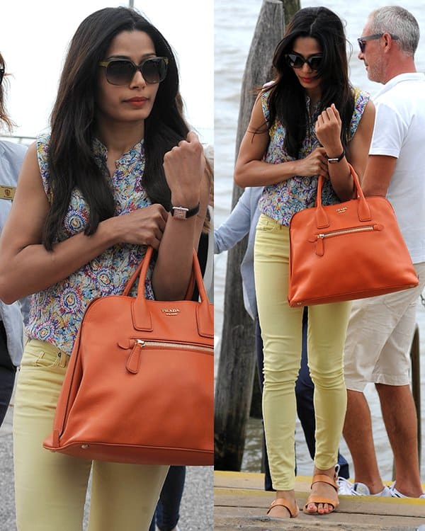 Freida Pinto leaving Venice, Italy, in canary yellow jeans on September 1, 2013