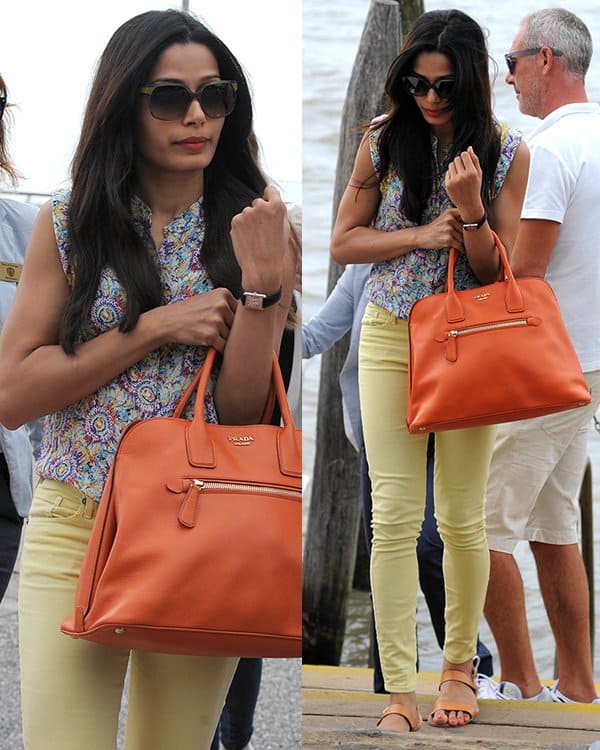 Freida Pinto leaving Venice, Italy, in canary yellow jeans by Citizens of Humanity and a printed top by Zadig & Voltaire