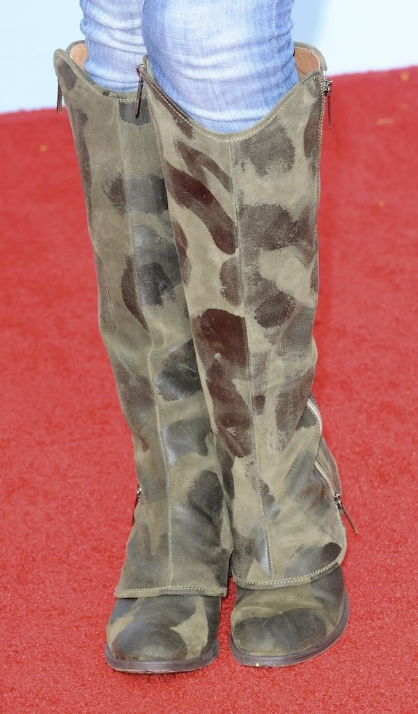 Gena Lee Nolin wearing knee-high “Devi3” suede boots from Donald Pliner