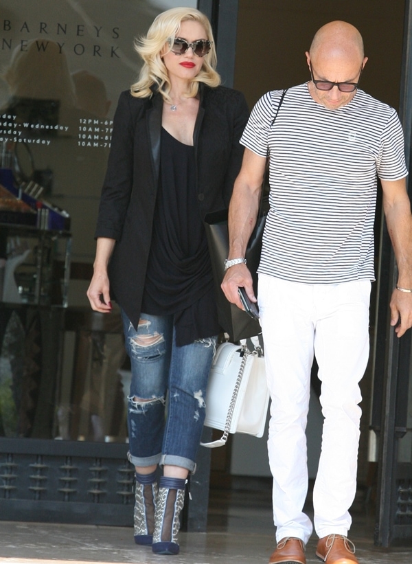 Gwen Stefani wears her signature ripped jeans