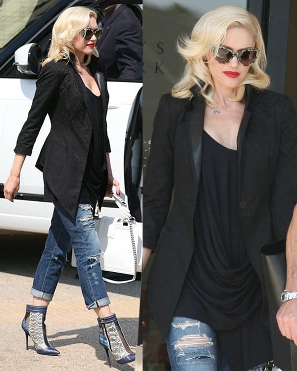 Gwen Stefani wears ripped boyfriend jeans while leaving Barneys New York in Beverly Hills