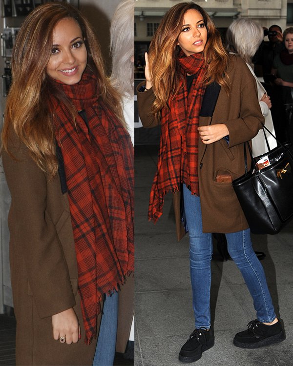 Jade Thirlwall dons a two-tone coat by Zara, accented with a red scarf, outside BBC Radio 1 in London