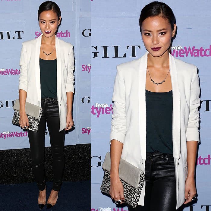 Jamie Chung dazzles at the People StyleWatch Denim Party in deep forest green leatherette jeans and a white blazer, September 19, 2013, at Palihouse in West Hollywood, California