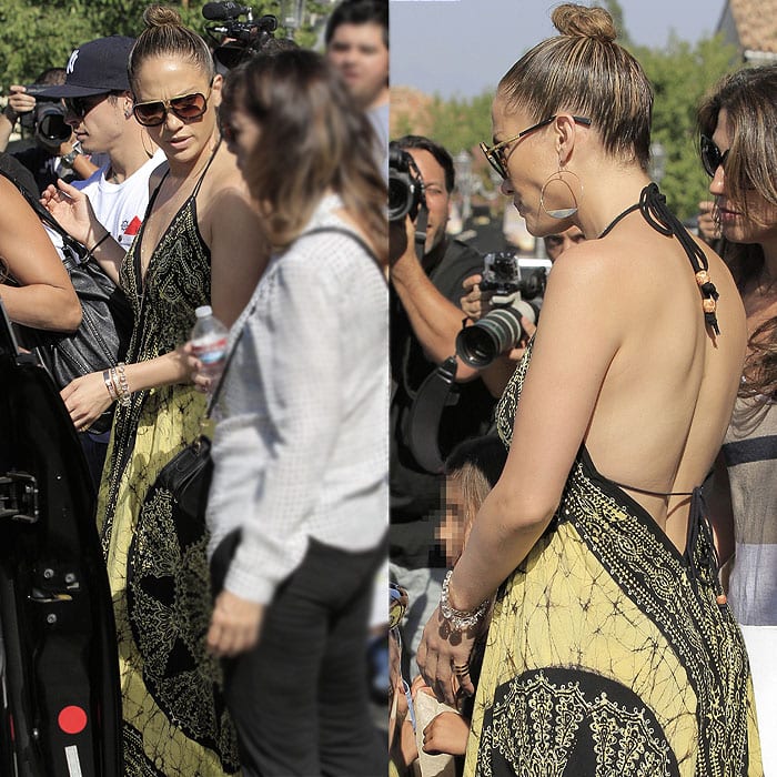 On September 14, 2013, Jennifer Lopez was spotted at Barnes & Noble wearing Dita Mach One sunglasses, Lana Jewelry Large Eclipse earrings, and Jean-Michel Cazabat Fela Elastic Strap wedge espadrilles in black