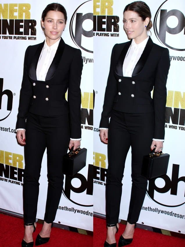 Jessica Biel wearing a Dolce & Gabbana suit with pointed pumps by Giambattista Valli and a box-shaped bag by Mark Cross