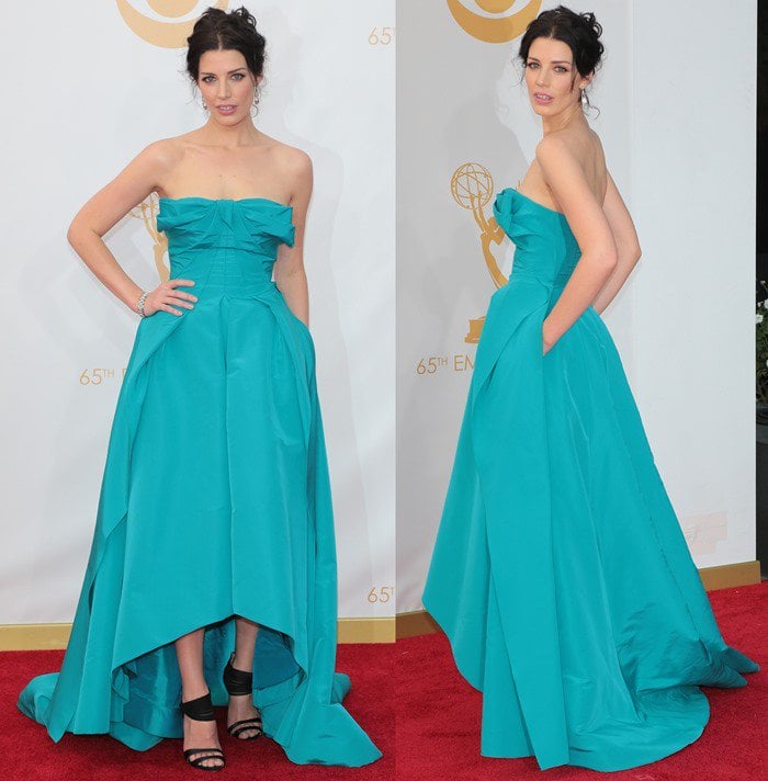 Jessica Pare wears a bright blue gown from Oscar de la Renta on the red carpet