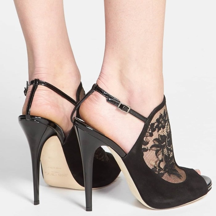 Decadent suede frames the ladylike lace of an impeccably cut sandal perched atop a slim, wrapped heel