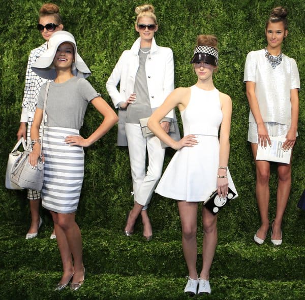 Models showcased Kate Spade's Spring/Summer 2014 collection at New York Fashion Week, featuring chic grey and white ensembles and playful accessories