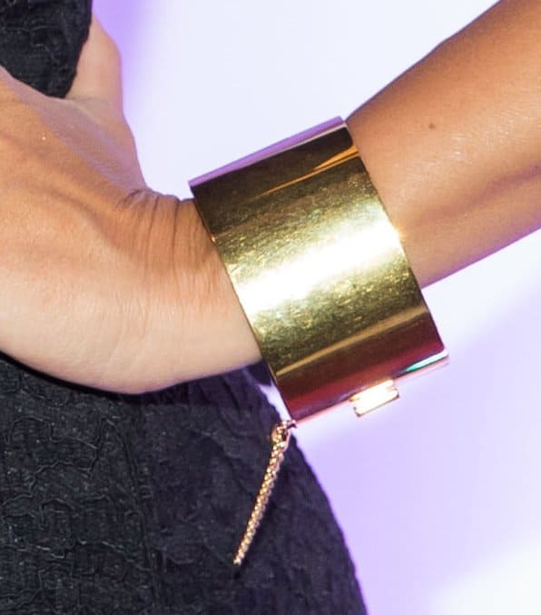Kourtney's chunky gold cuff with a chain detail