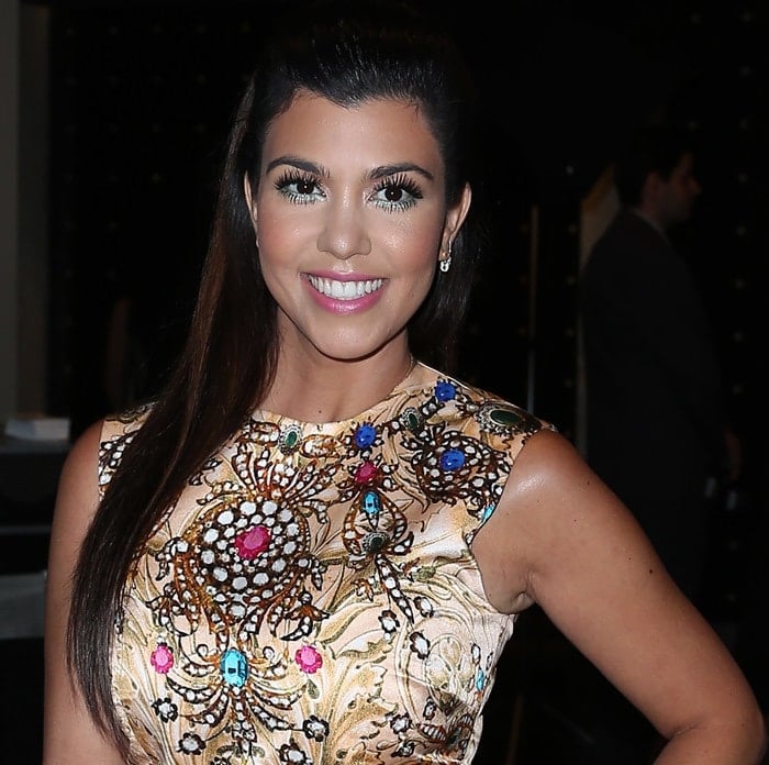 Kourtney Kardashian's glamorous gold mini dress by ASOS was intricately detailed with colorful gems