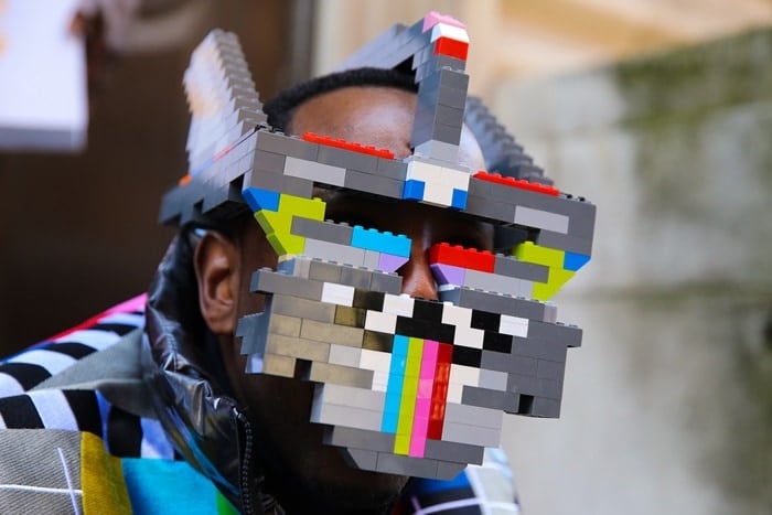 Man wearing face mask made out of Lego