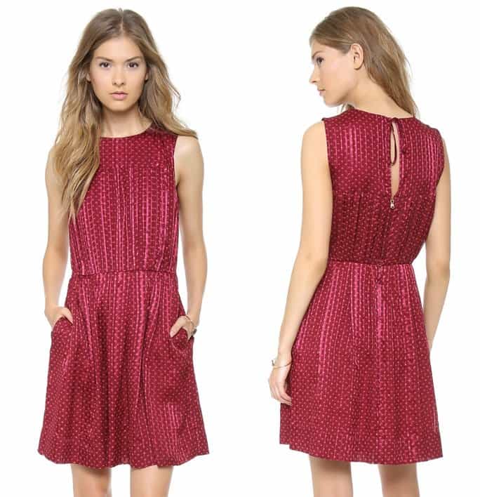 Inverted box pleats add volume to the blouson bodice of a sleeveless merlot red dress, patterned with lustrous stripes and delicate polka dots