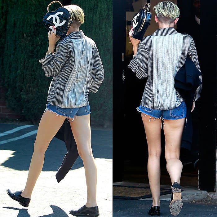 Miley Cyrus pairs a playful heart-shaped Chanel handbag with daringly short Levi's cutoffs, showcasing her famed legs in Los Angeles