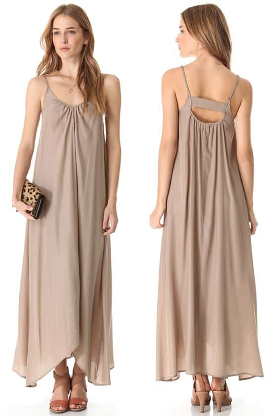 A lustrous maxi dress moves with ease, and a cutout back reveals a sexy peek of skin