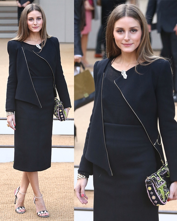 At the Burberry Prorsum show during London Fashion Week on September 16, 2013, Olivia Palermo styled a chic Tibi cami in black with Sergio Rossi Oberoy sandals in pastel pink and a sophisticated Fendi bag