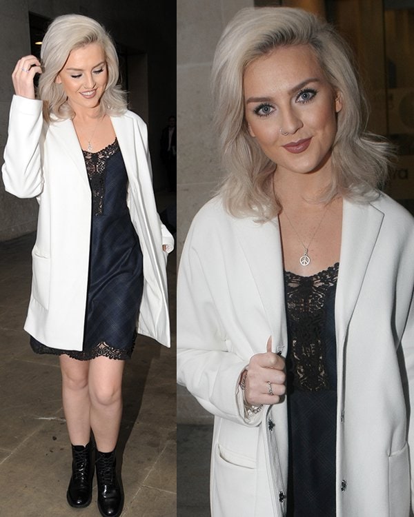 Perrie Edwards layers a white Topshop boyfriend coat over a lace dress for a stylish look outside BBC Radio 1 in London