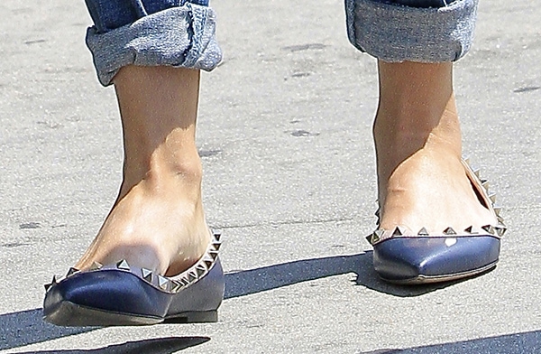 Spotlight on Style: Reese Witherspoon shows off her new favorite Valentino Rockstud flats, a stylish blend of sophistication and comfort