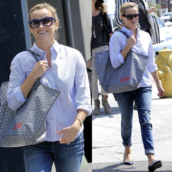 Reese Witherspoon shows off her ripped Black Orchid jeans