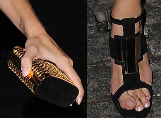Rosie Huntington-Whiteley shows off her gold clutch and toes