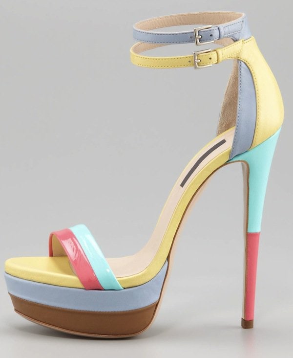 This Ruthie Davis sandal features a sprightly color story, a strappy silhouette, and a sky-high heel