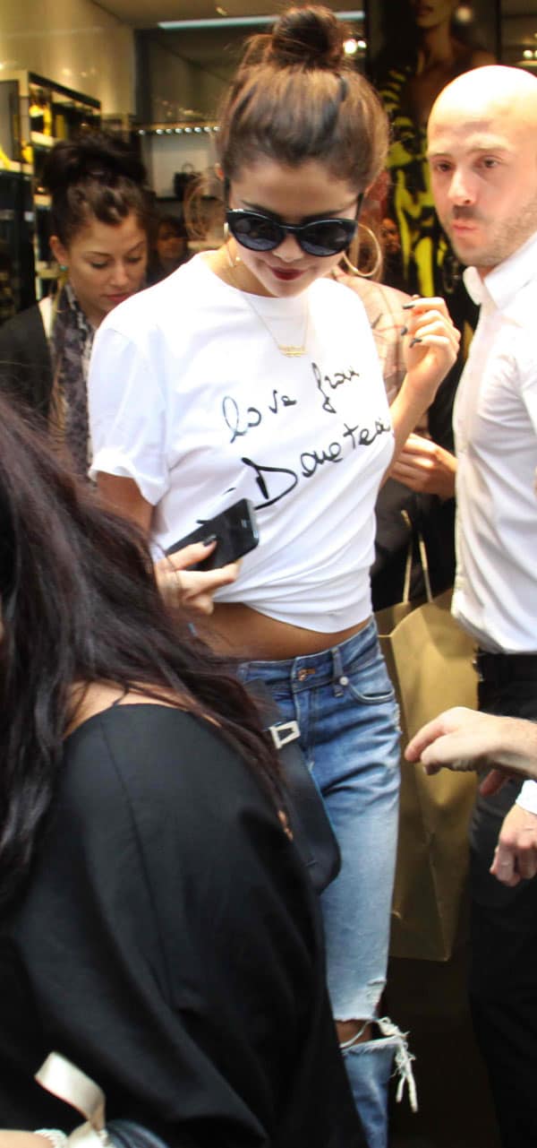 Selena Gomez hiding her eyes behind chic cat-eye sunglasses