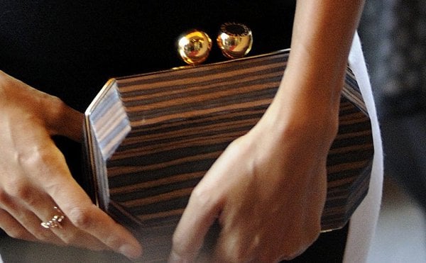 Thandie Newton carrying a box clutch