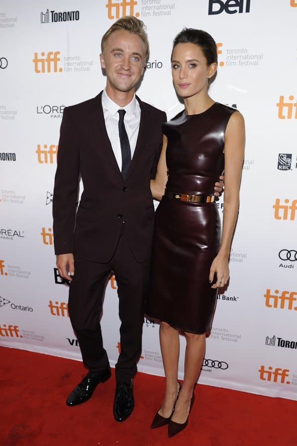 Celebrity style done right: Tom Felton and Jade Olivia match effortlessly in Burberry at the 2013 TIFF