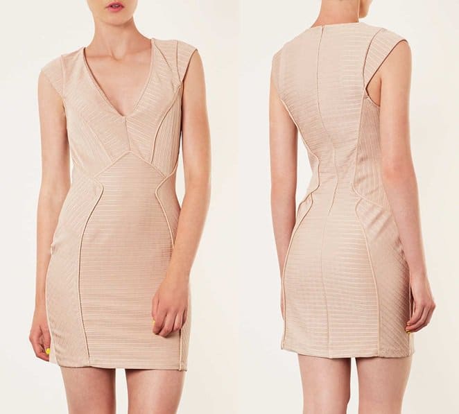A plunging V-neckline and figure-sculpting silhouette enhance the ultra-sultry appeal of this finely ribbed Topshop sheath dress, nuanced with contemporary allover seam details