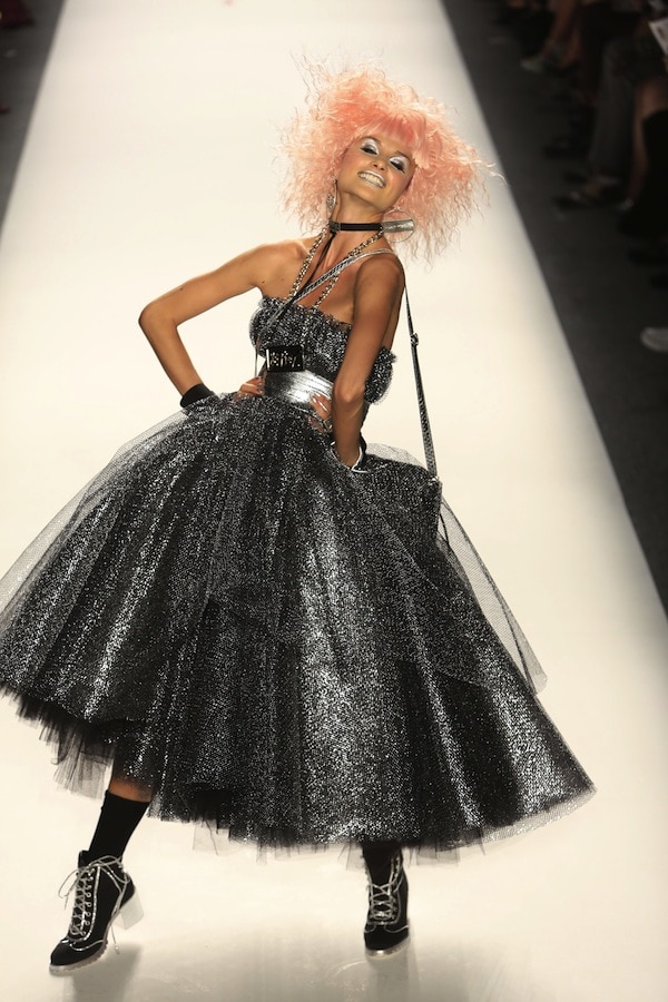 Model flouncing down the catwalk and showing off Betsey Johnson's latest creations