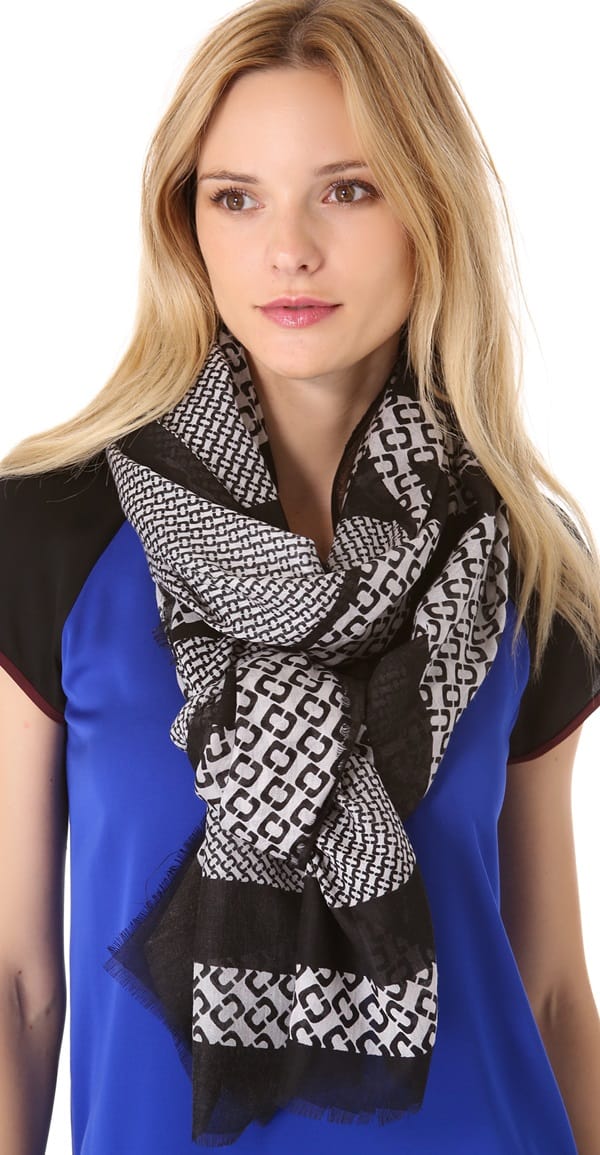 Signature Accessory: Diane von Furstenberg's Hanover scarf featuring a logo chain link print – $165