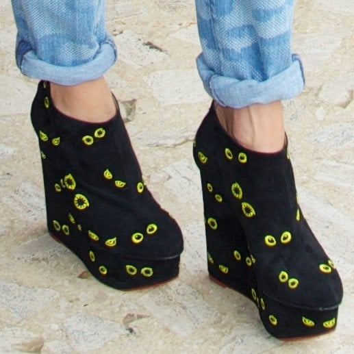 Model Jessica Hart being quirky with a pair of printed wedge booties for 2014 Mercedes-Benz Fashion Week in New York City on September 10, 2013