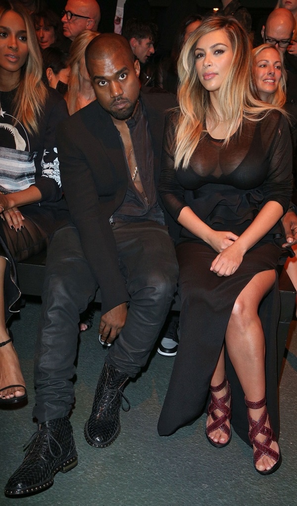 Kim and Kanye sit front row of Givenchy's Spring 2014 presentation during Paris Fashion Week