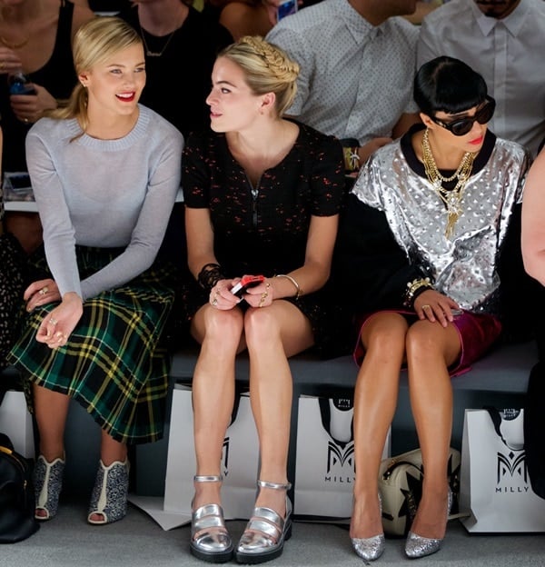 Model Kyleigh Kuhn, DJ and actress Chelsea Leyland, and singer-songwriter Natalia Kills sporting interesting shoes while attending the Milly presentation