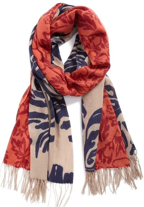 Classic prints pattern a two-tone scarf cast in a soft and cozy blend of wool and cashmere