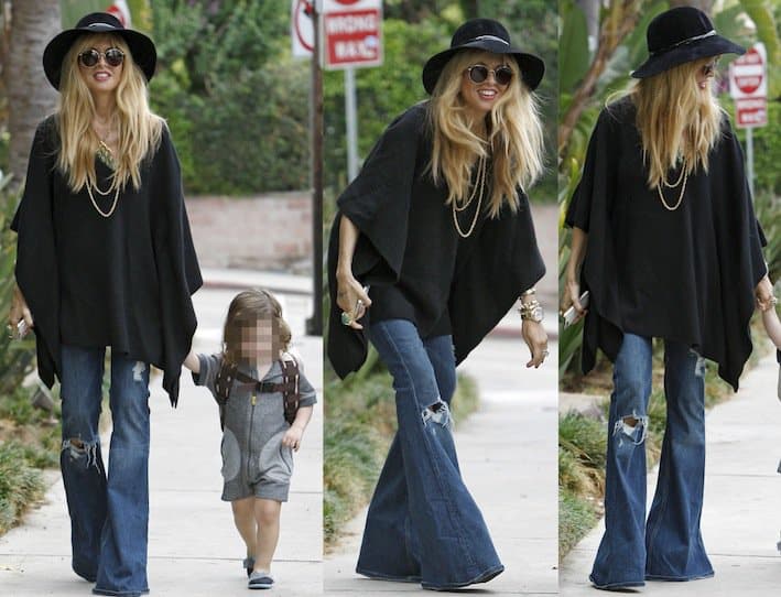 Rachel Zoe in shredded super flared jeans with her son, Skyler, in West Hollywood