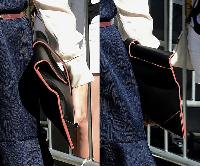 Olivia Palermo accessorizes with a sophisticated oversized envelope clutch at NYFW 2013