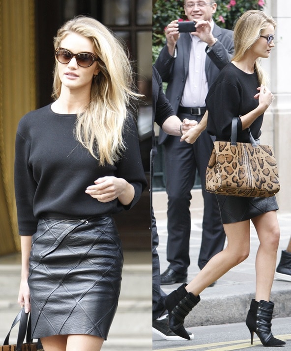 Rosie Huntington-Whiteley wearing a classic black silk blouse and a quilted leather miniskirt