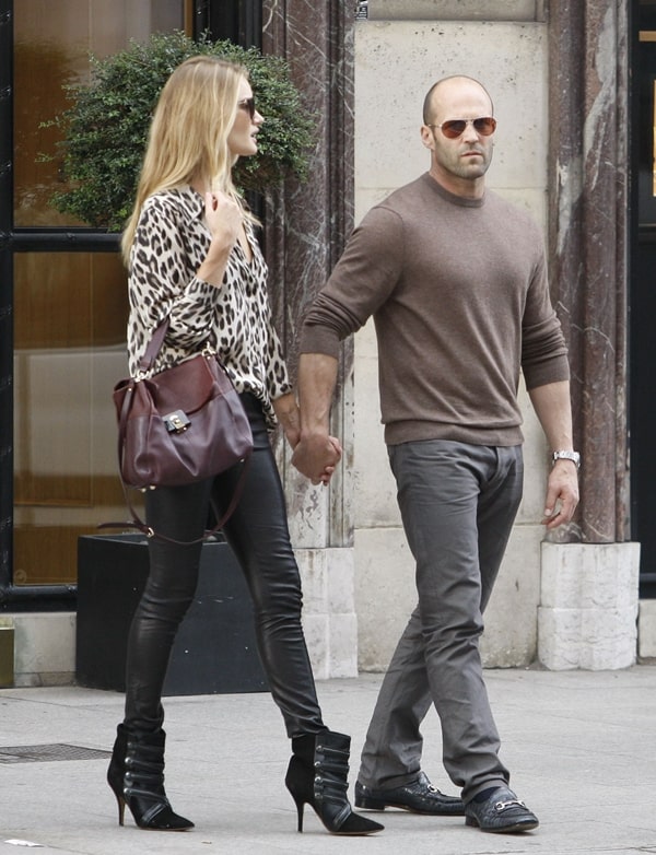 Rosie Huntington-Whiteley and Jason Statham looking stylish in Paris during Fashion Week on September 25, 2013